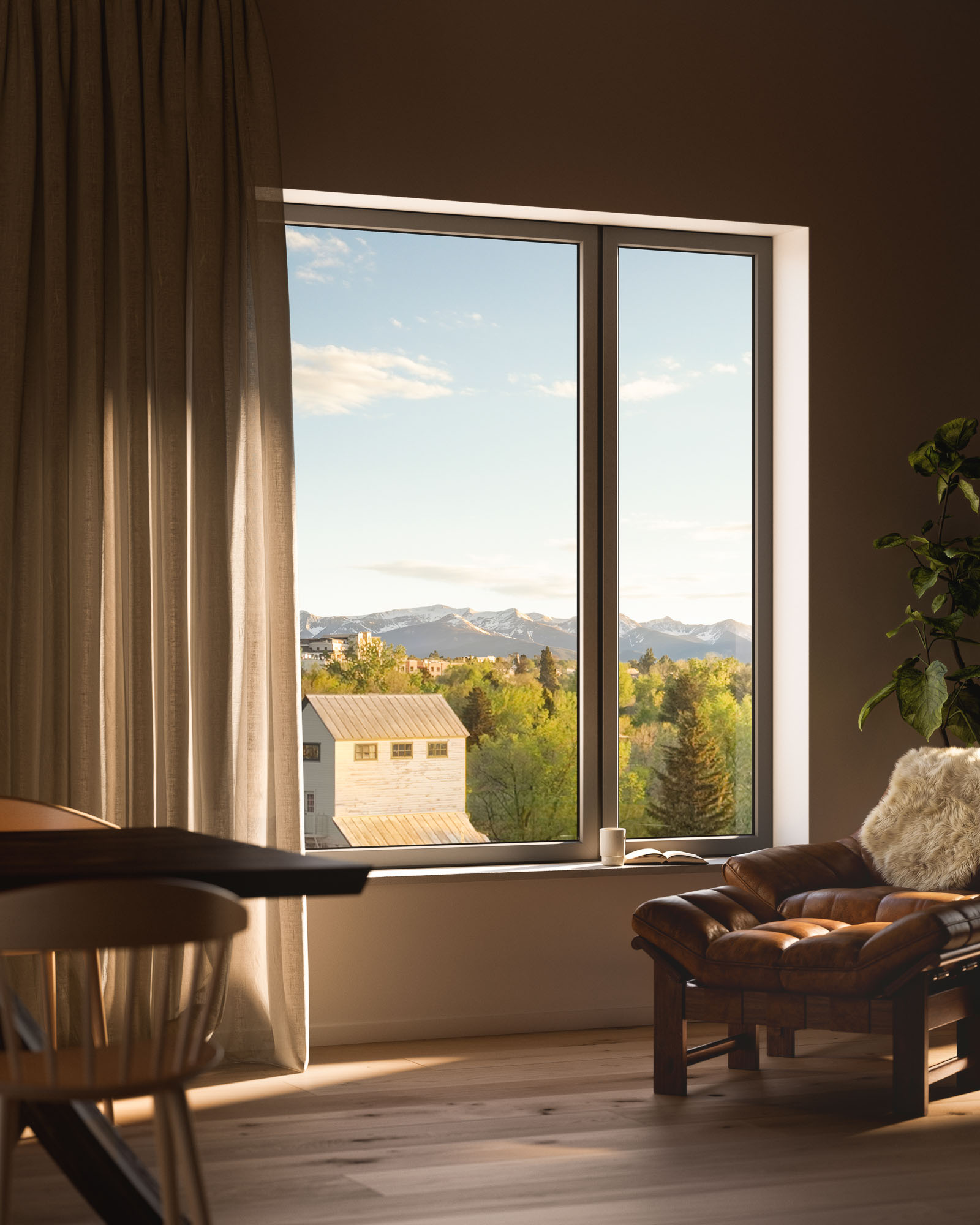 rendering of a chair by a window overlooking Bozeman, Montana with the mountains in the background