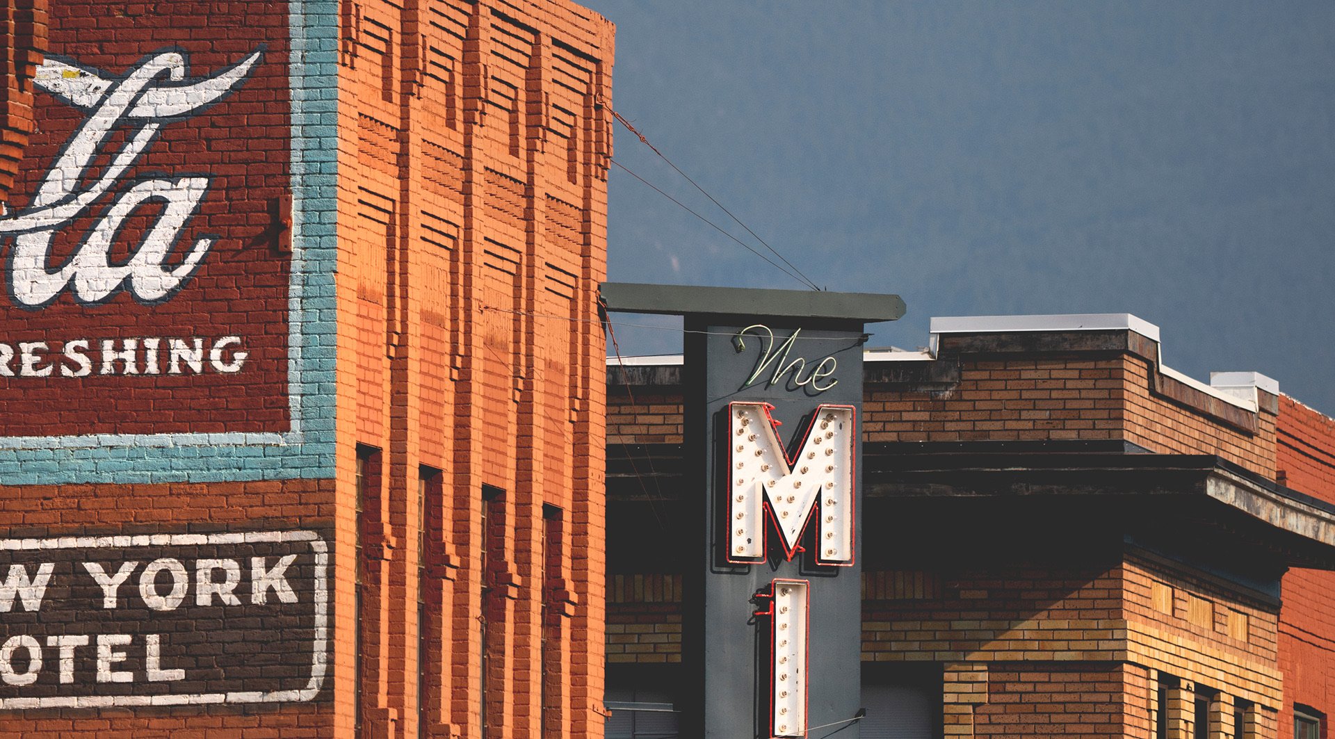 the top of the sign for The Mint Bar & Grill in Livingston, Montana